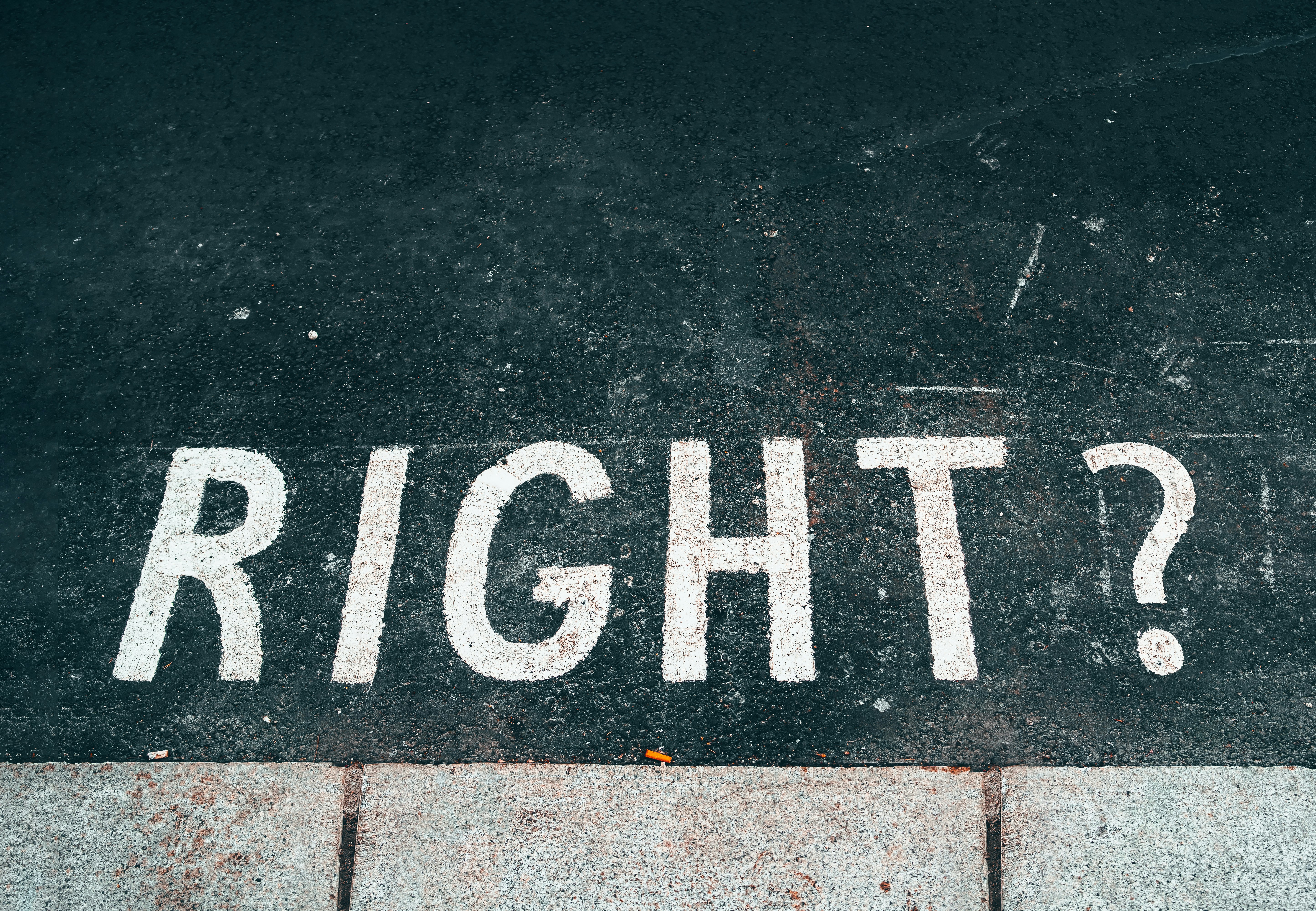 black and white stop road sign